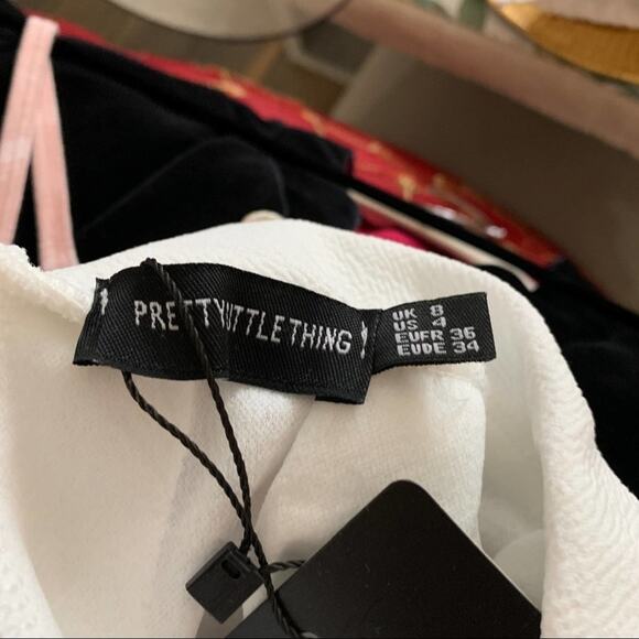 Pretty little thing white pleated mini side split tennis skirt. Size is US 4 - Picture 9 of 10